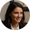 A circular profile picture of Jessica Miller, an attorney, in a professional setting.